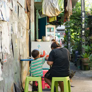 Parent and child in eating place