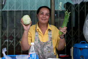 Woman having cabbage and chive