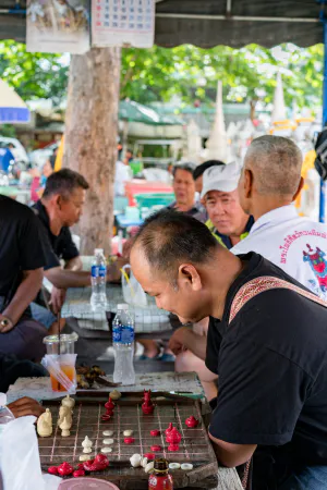 Men playing Thai chess
