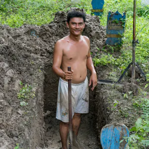 Man digging grave