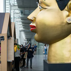 Artwork of Huge head placed in CentralWorld