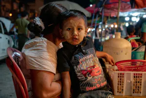 Boy painted Thanaka on face