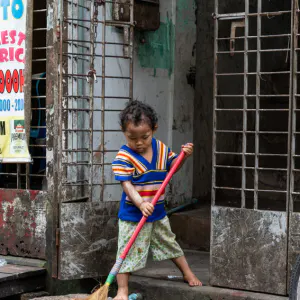 Little kid making a sweep
