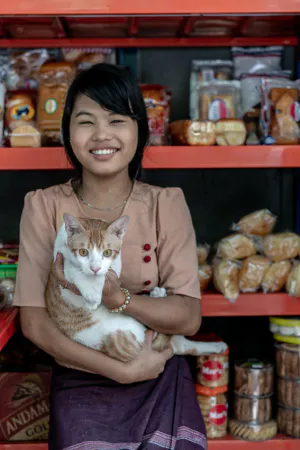 Girl holding cat
