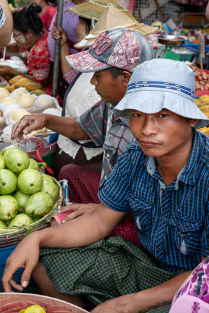 Man selling fruits in street market