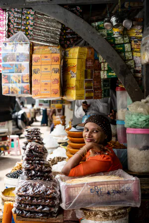 Woman surrounded by goods