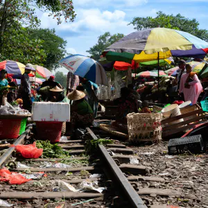 Vendor doing business on railway track
