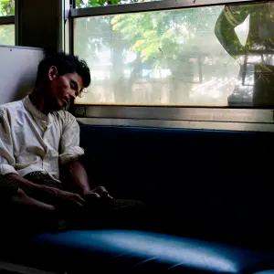 Man sleeping well on train car