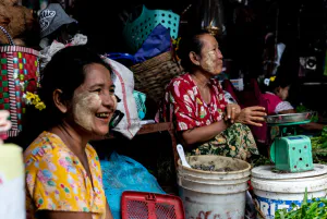 Smiling women in market