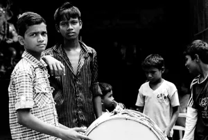 Boys practicing drumming