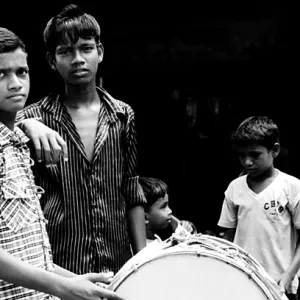 Boys practicing drumming