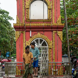 Men coming out of clock tower