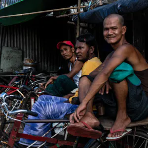 Pedicab drivers waiting for customers