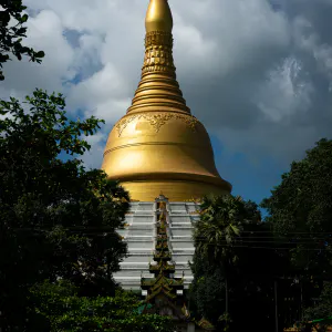 Golden Mahazedi Pagoda under blue sky