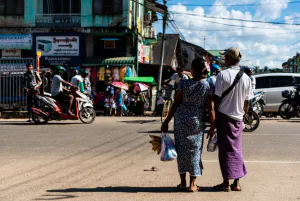 Couple crossing wide street