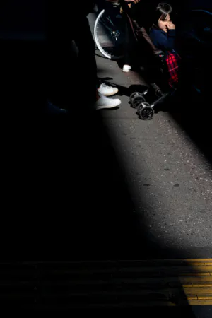 Baby buggy going through sunny spots