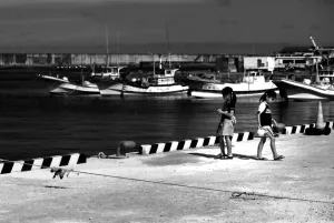 two girls playing in harbor in the isle of Irabu