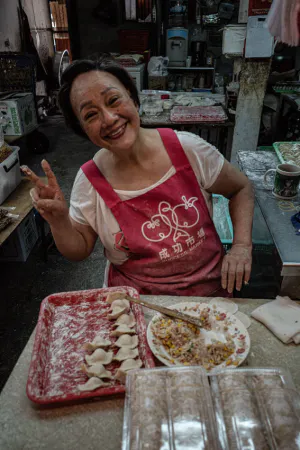Woman making Jaozi in market