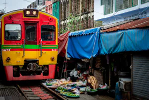Train coming into Mae klong Railway Market