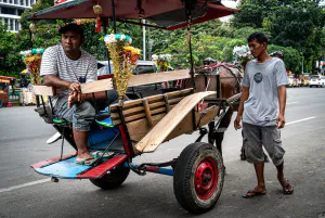 Coachmen waited for customers near Fatahillah Square in Jakarta