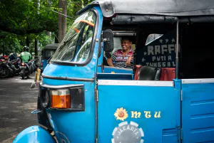 Smiling Bajaj driver