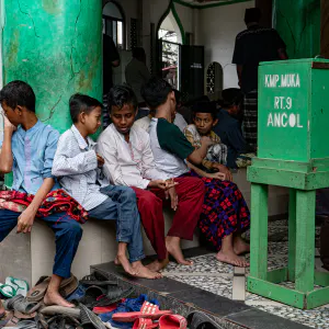 Boys at the entrance to a mosque