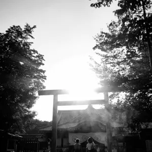 Two shadows in front of Torii in Yasukuni Jinja
