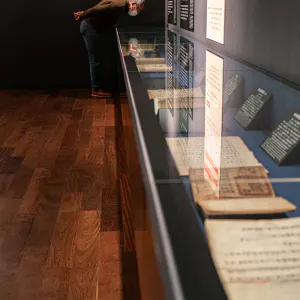 Man viewing an exhibit at the Toyo Bunko Museum