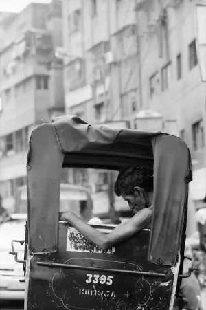Rickshaw wallah sleeping
