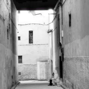 Figure in narrow alley