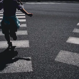 Girl crossing an intersection