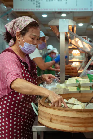 Woman grabbing Tangbao