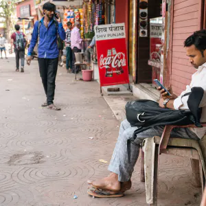 Man staring at his phone