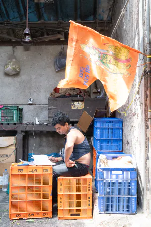 Man looking at the ledger