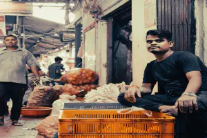 Man selling in the aisle.