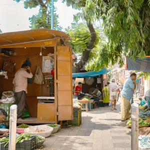 Sidewalk lined with street vendors