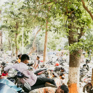 Boy sleeping on a motorcycle