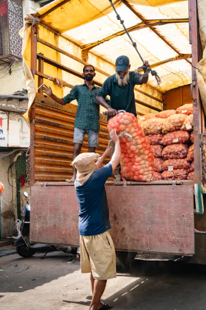 Men sleeping on carts