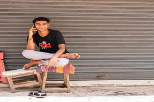 Young man talking on cell phone