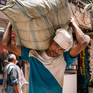 Man with a towel wrapped around his head