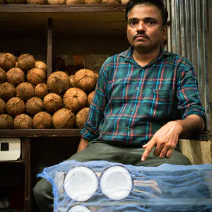 Man selling coconuts