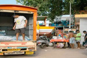 Shaved ice stand with people lined up