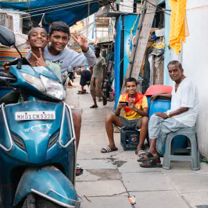 People relaxing in an alley