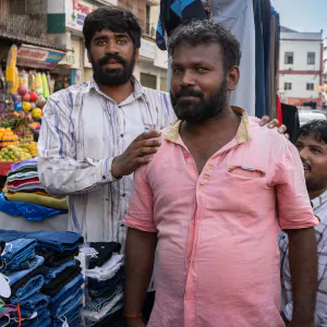 Men selling trousers