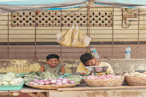 Parent and child working at a grocery store