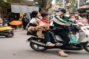 Family of four on one motorcycle