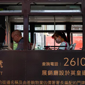 Double-decker tram running in Hong Kong