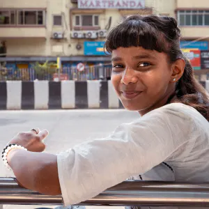 Girl at a bus stop