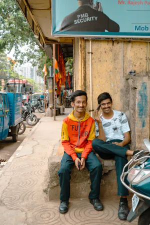 Two men on the sidewalk