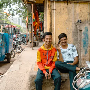 Two men on the sidewalk